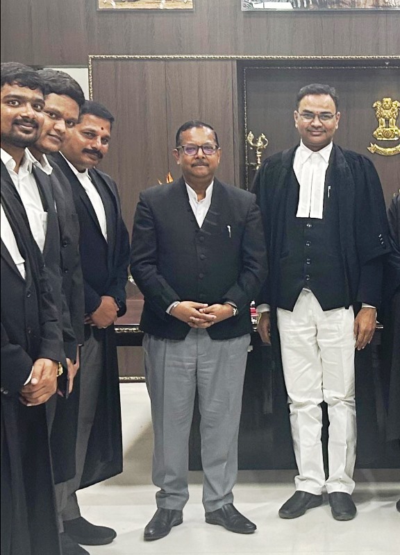Justice Ujjal Bhuyan with some lawyers at at High Court of Judicature at Hyderabad