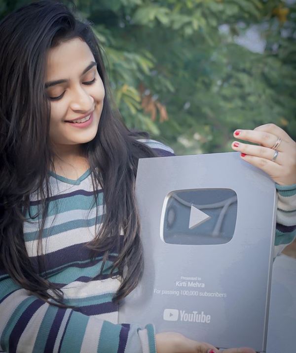 Kirti Mehra with YouTube silver play button