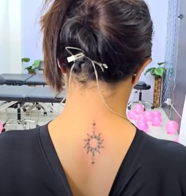 Kirti Mehra's tattoo on her back