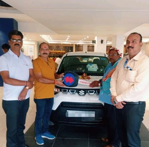 Mahesh Pandey's family members with their first family car