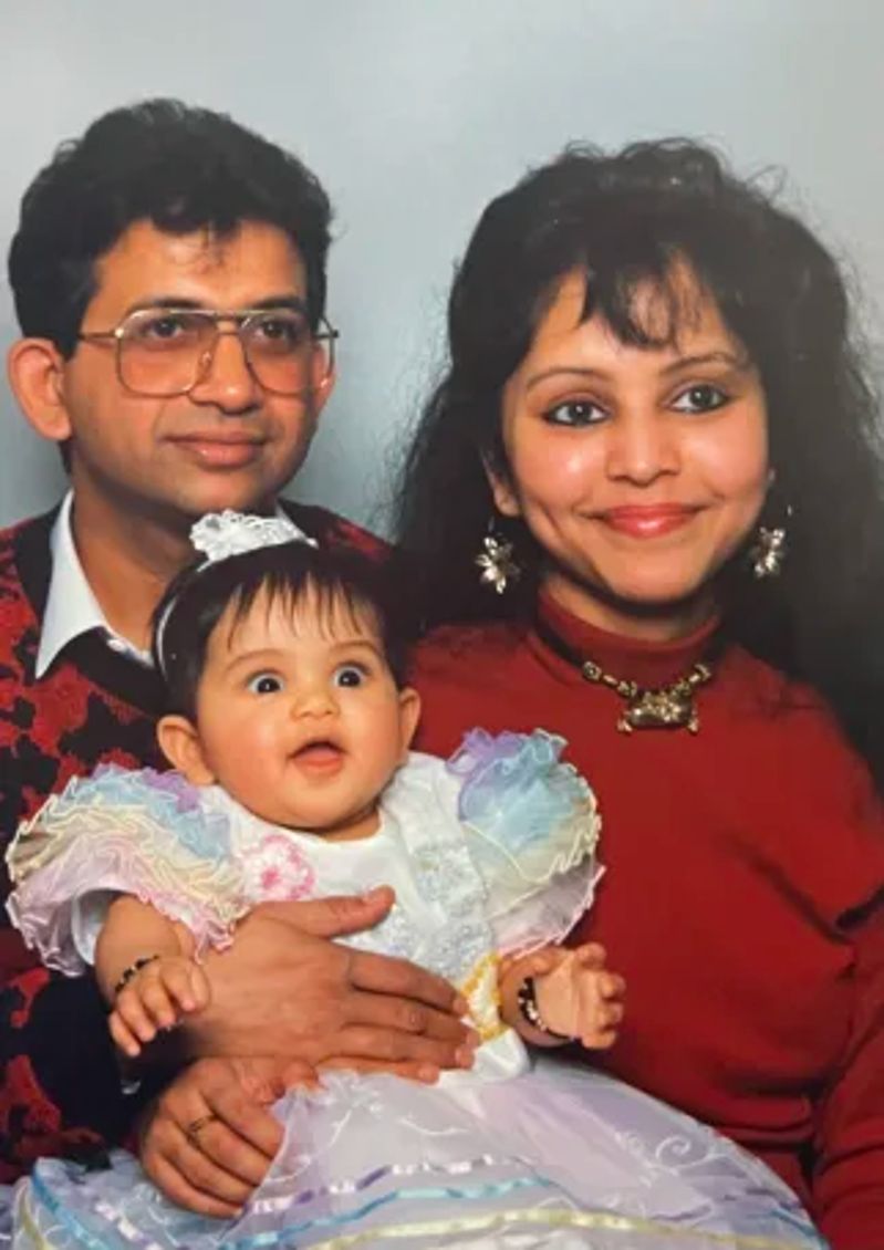 Maria Thattil with her parents in her childhood