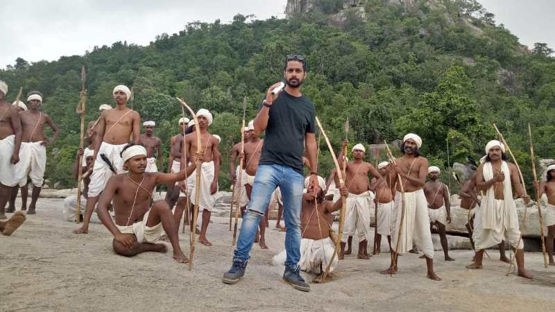 Mayank Dixit with tribal people during the shooting of the film 'Birsa Munda'