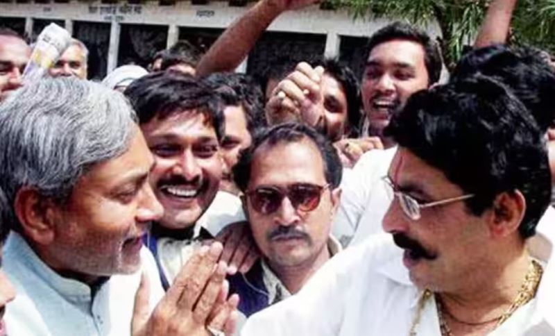Nitish Kumar (left) greeting Anant Kumar Singh (right) with folded hands