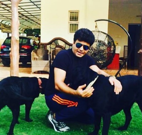 Raja Chaudhary with his pet dogs