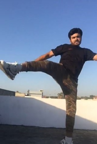 Raja Chaudhary working out at his home