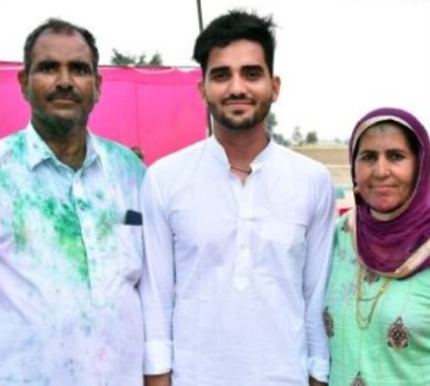 Ravi Sihag with his father and mother