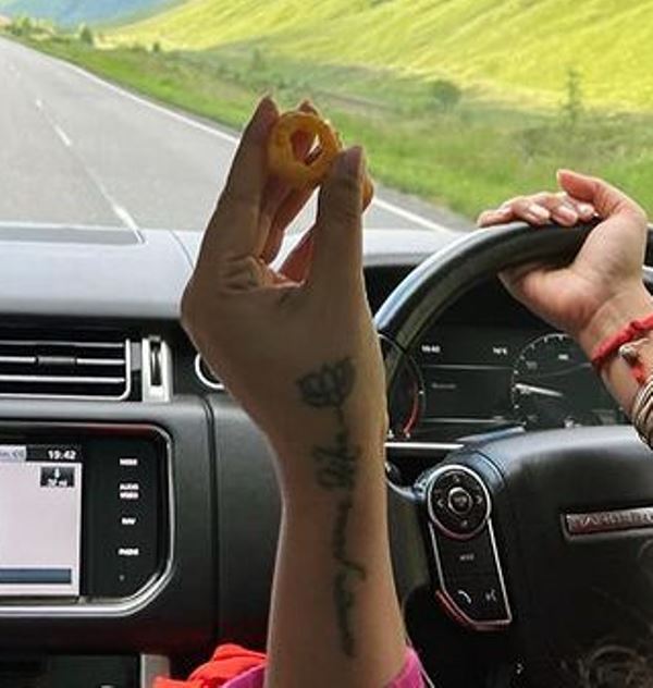 Renu Desai's tattoo on her left hand's wrist