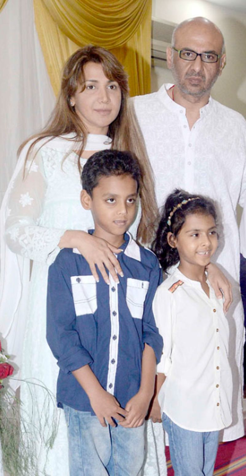Ritu Shivpuri with her husband and children