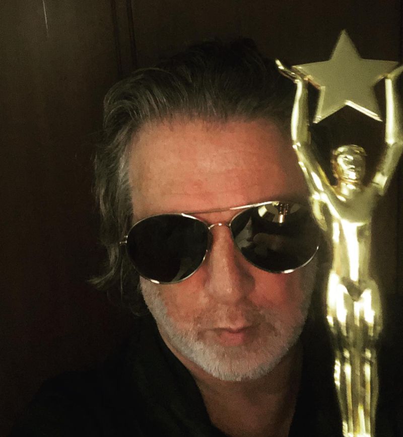Rohit Bal with an award
