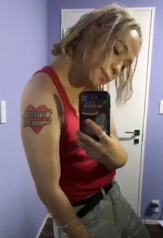 Ryuchell's tattoo on their right arm