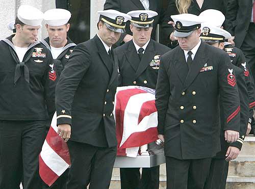 SEALs carrying the coffin of Michael P. Murphy
