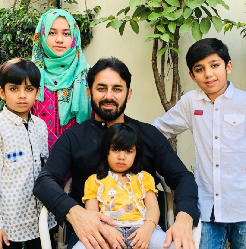 Saeed Ajmal with his wife and children