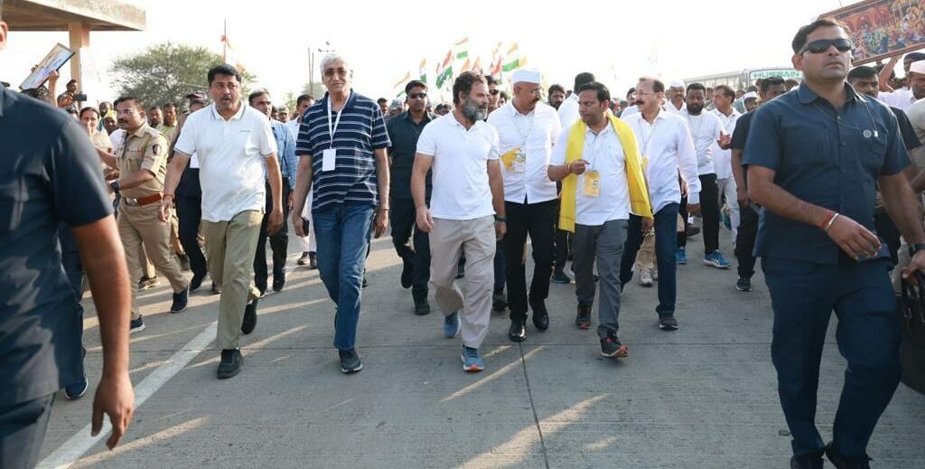 T. S. Singh Deo (in blue striped t-shirt) with Rahul Gandhi during the Bharat Jodo Yatra