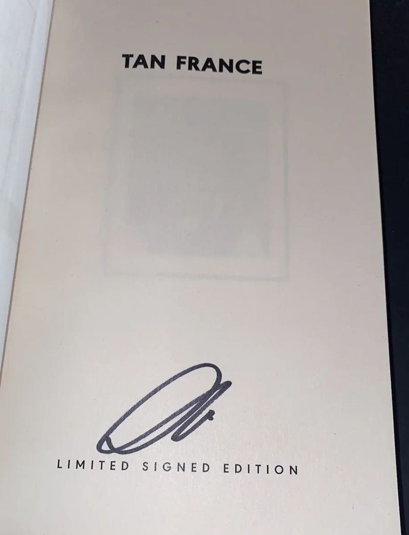 Tan France's signature
