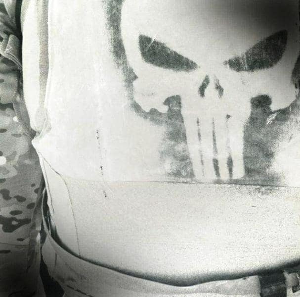 The iconic Punisher logo spray painted on Chris Kyle's bulletproof jacket