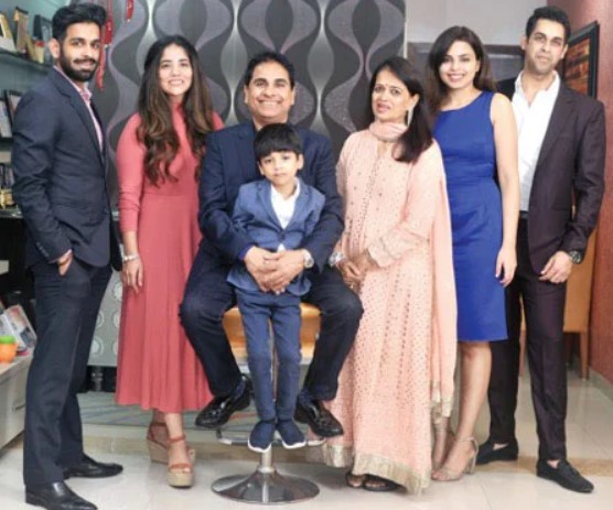 Vijay Kedia posing with his family