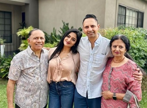 Vimala Raman with her parents and brother