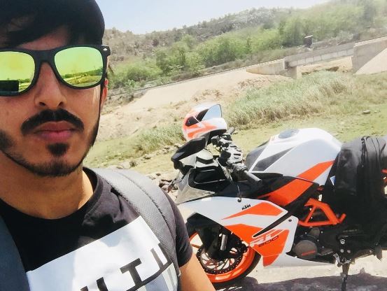 Vishal Singh posing with his KTM during one of his trips