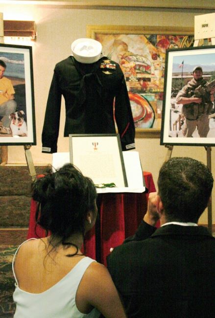 A photo of Danny's uniform on display