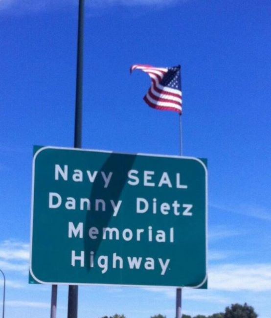 A photo of the Danny Dietz Memorial Highway board
