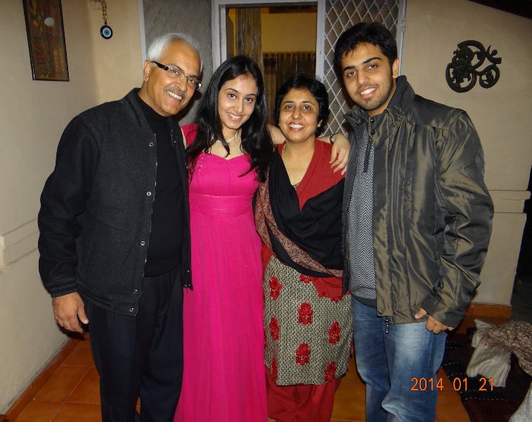 A picture of Ajay Kumar Bhalla with his wife, Jyoti Grover Bhalla, and children Akriti Bhalla and Girik Bhalla