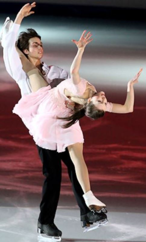 A picture of Alexandra Paul and Mitchell Islam at the 2010 World Junior Figure Skating Championships, performing to Eva Cassidy's Over the Rainbow