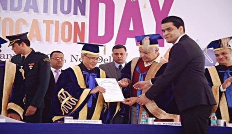 Abby receiving the Gold Medal for Academic Excellence in Hepatology from President Pranab Mukherji
