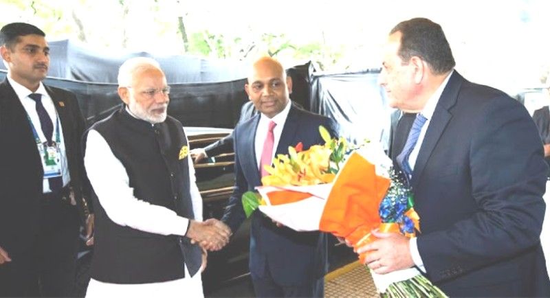 Abhay Kumar (second from the right) receiving PM Modi in Buenos Aires