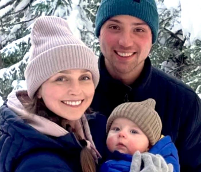 Alexandra Paul alongside her husband, Mitch Islam, and son, Charlie