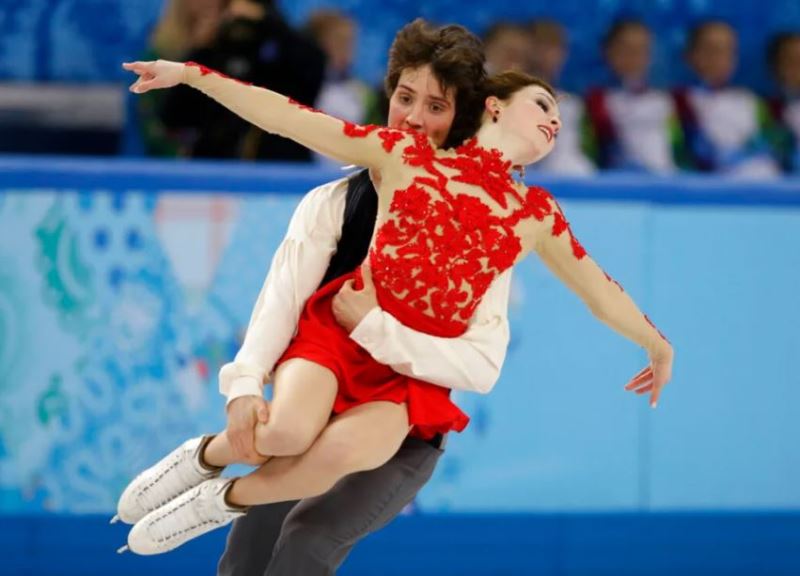Alexandra Paul and Mitchell Islam of Canada perform their free dance during the ice dancing competition at the Iceberg Skating Palace during the Winter Olympics in Sochi, Russia, February 17, 2014