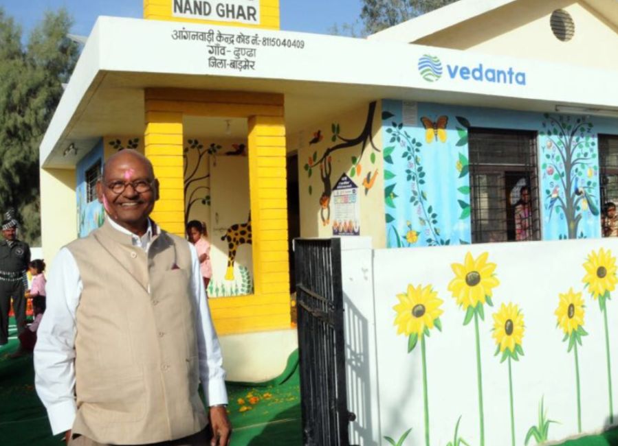 Anil Agarwal in front of a Nand Ghar (Anganwadi), a Vedanta Group initiative