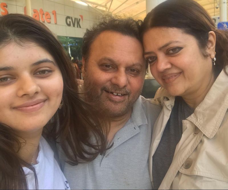 Anil Sharma with his daughter (left) and wife (right)