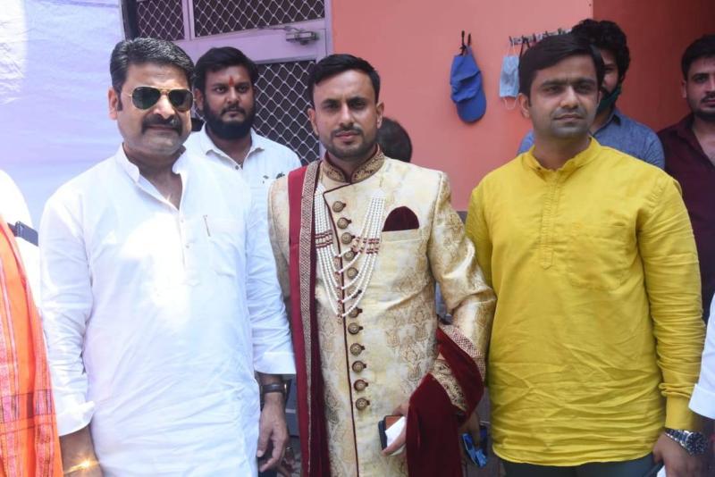 Anuj Chaudhary (centre) dressed as a groom on his wedding day