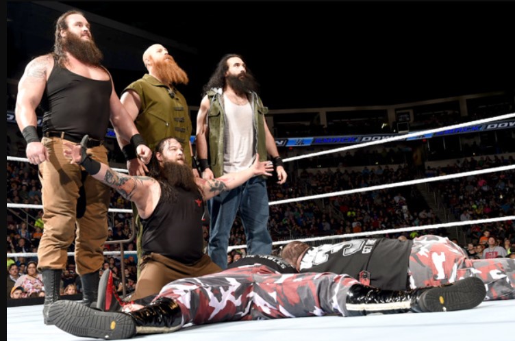 Bray Wyatt (sitting) with The New Wyatt Family