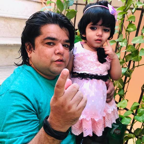 Danish Maqsood with his daughter