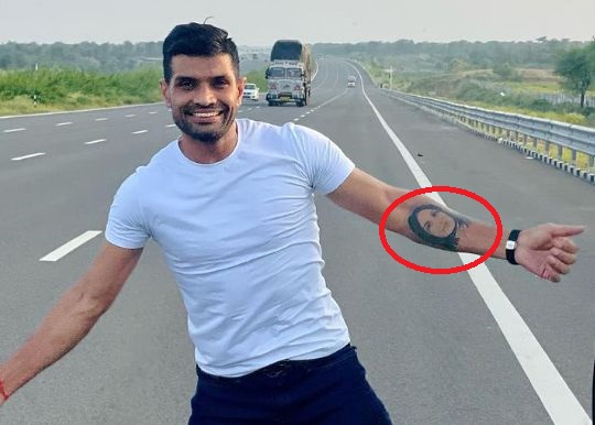 Deepak Niwas Hooda's tattoo on arm