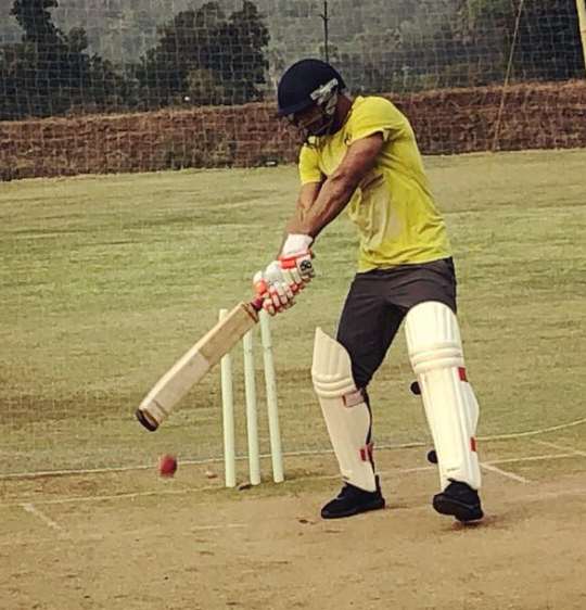 Deepak playing cricket