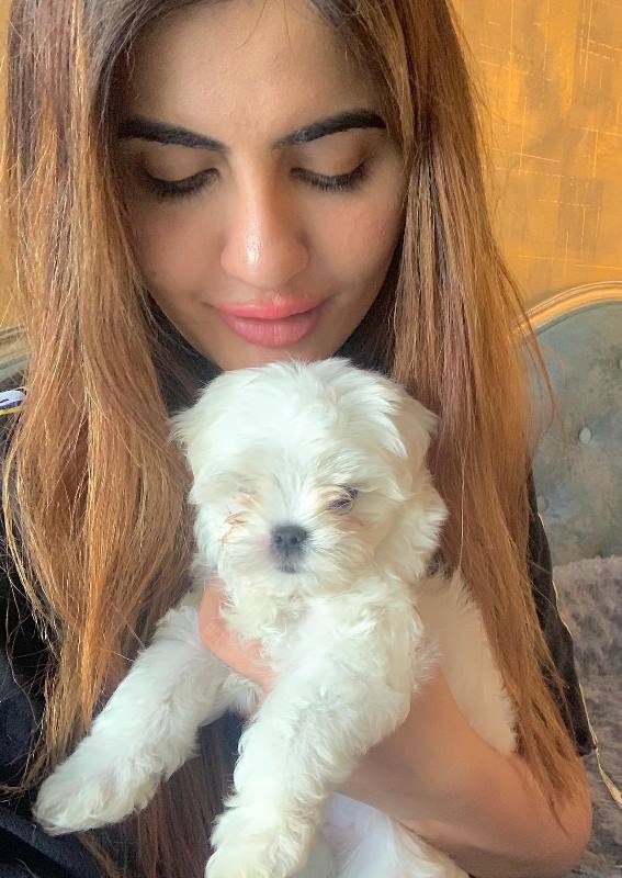 Deepti Sadhwani with her pet dog named Coco