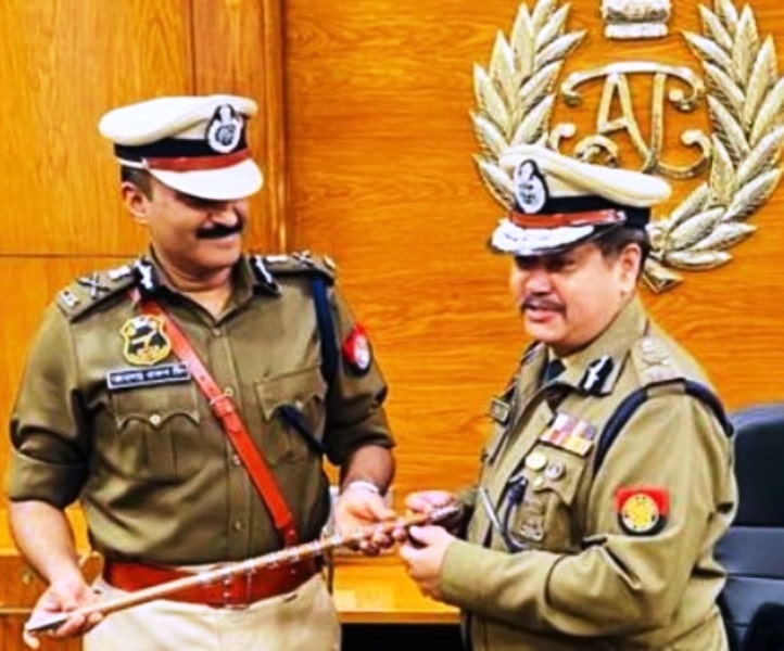 G. P. Singh with his predecessor after becoming the Director General of the Assam Police