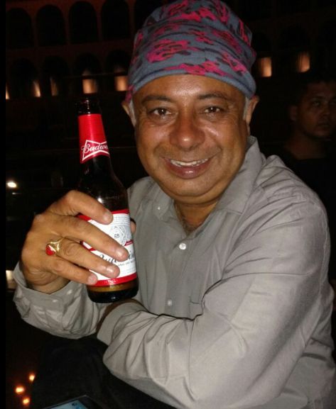 Girish Thapar drinking beer