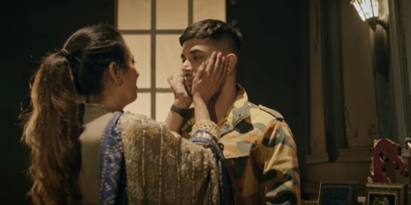 Gitaz Bindrakhia with his mother Preet Kamal in a still from the song 'Gall Baap Di'