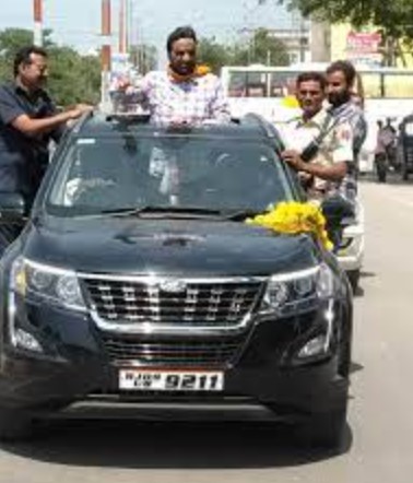 Hanuman Beniwal in his Ford car