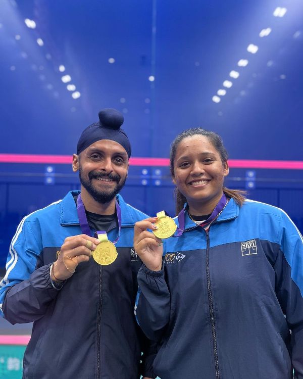 Harinder Sandhu with Dipika Pallikal after winning the gold medal at the Asian Mixed Doubles Championship in Hangzhou, China