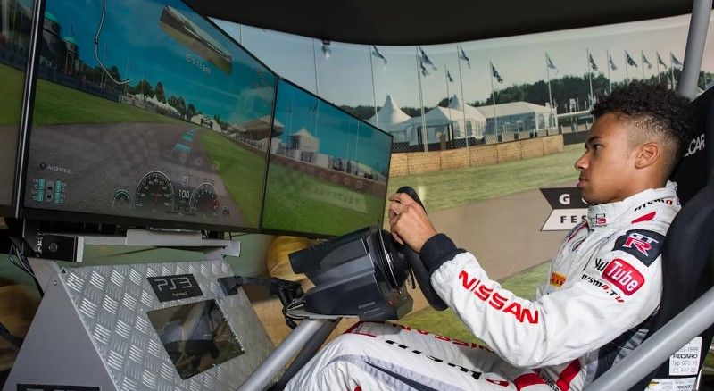 Jann Mardenborough playing Gran Turismo 6 at Nissan