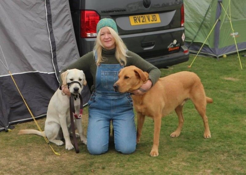 Jann Mardenborough's mother, Lesley-Anne Mardenborough, with his pet dogs