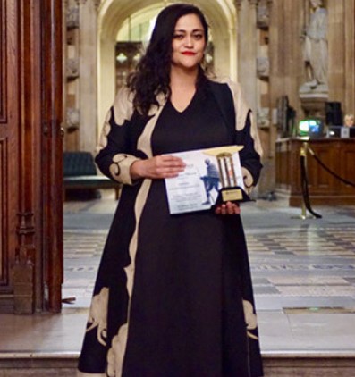 Kalli Purie posing with her award during the Confluence Excellence awards at the British Parliament