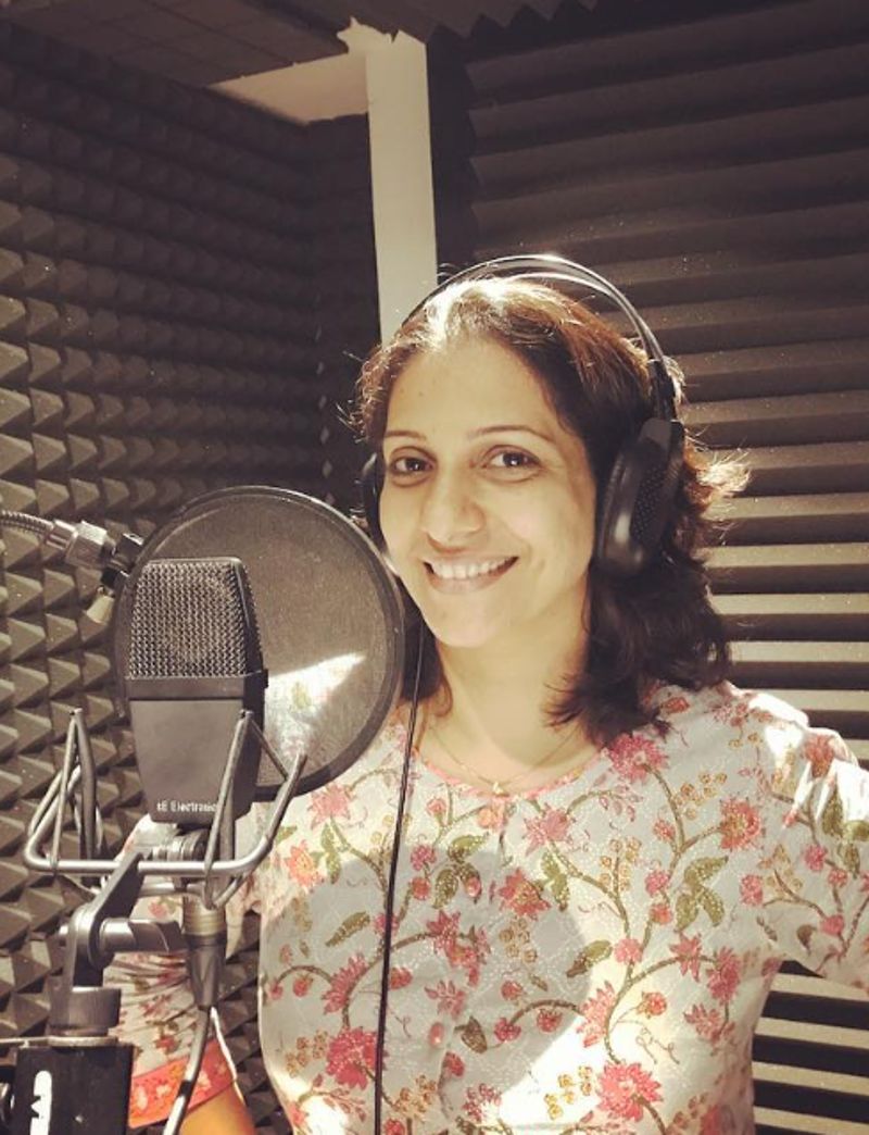 Madhura while recording an audiobook
