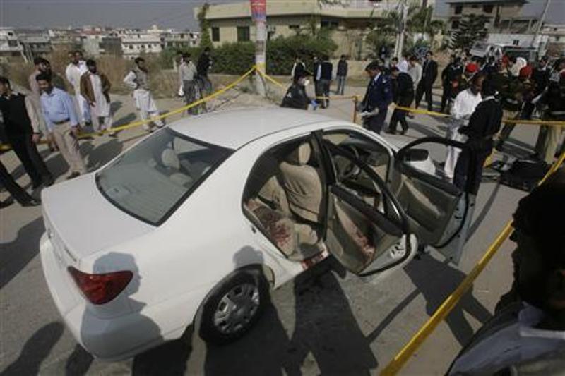 Major General Ameer Faisal Alavi's car in which he was shot dead