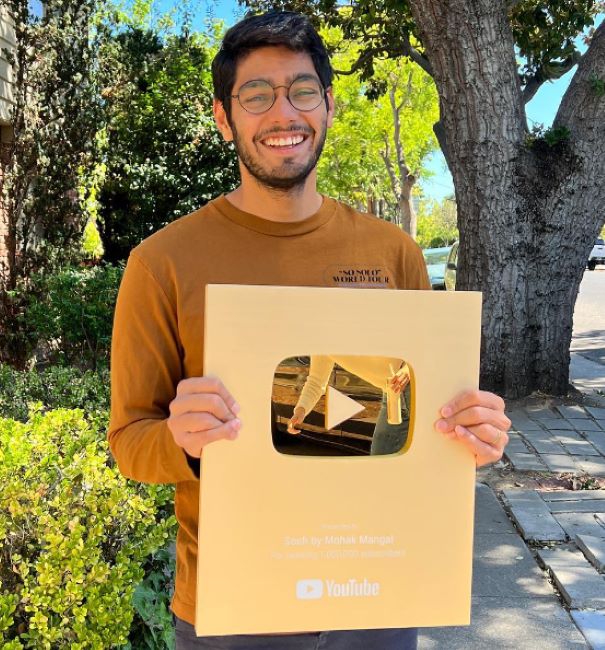 Mohak Mangal with the golden YouTube Play Button