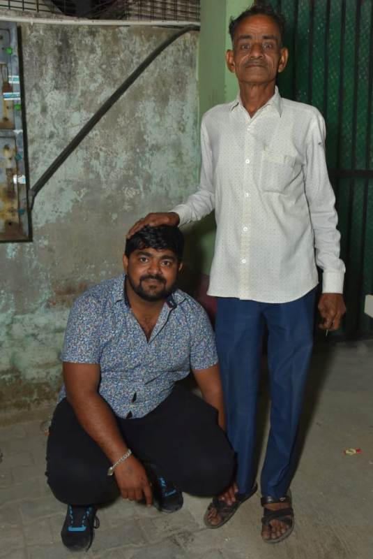 Monu Manesar with his father, Om Prakash